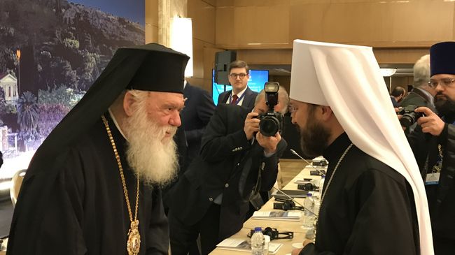 Глава Элладской православной церкви Архиепископ Афинский и всей Греции Иероним и митрополит Волоколамский Иларион на форуме по религиозному плюрализму в Афинах, Греция. 30 октября 2017 Глава Элладской православной церкви Архиепископ Афинский и всей Греции Иероним и митрополит Волоколамский Иларион на форуме по религиозному плюрализму в Афинах, Греция. 30 октября 2017