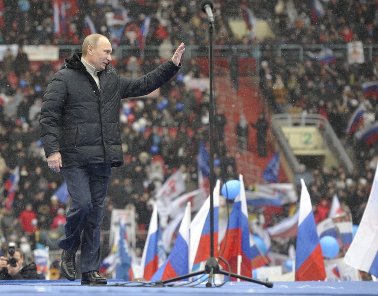 Премьер-министр РФ Владимир Путин выступает на митинге Защитим страну! в спорткомплексе Лужники Премьер-министр РФ Владимир Путин выступает на митинге Защитим страну! в спорткомплексе Лужники