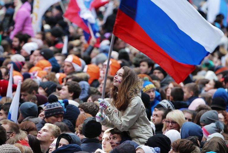 Посетители перед началом митинг-концерта Россия объединяет! на большой спортивной арене Лужники в Москве. 4 ноября 2017 Посетители перед началом митинг-концерта Россия объединяет! на большой спортивной арене Лужники в Москве. 4 ноября 2017