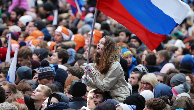 Посетители перед началом митинг-концерта Россия объединяет! на большой спортивной арене Лужники в Москве. 4 ноября 2017 Посетители перед началом митинг-концерта Россия объединяет! на большой спортивной арене Лужники в Москве. 4 ноября 2017