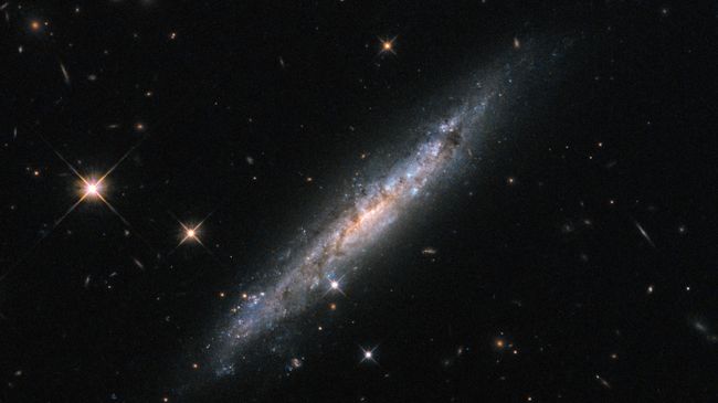 Галактика ESO 580–49 в созвездии Весов