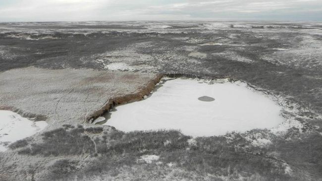 Воронка в Ямало-Ненецком автономном округе. Архивное фото Воронка в Ямало-Ненецком автономном округе. Архивное фото