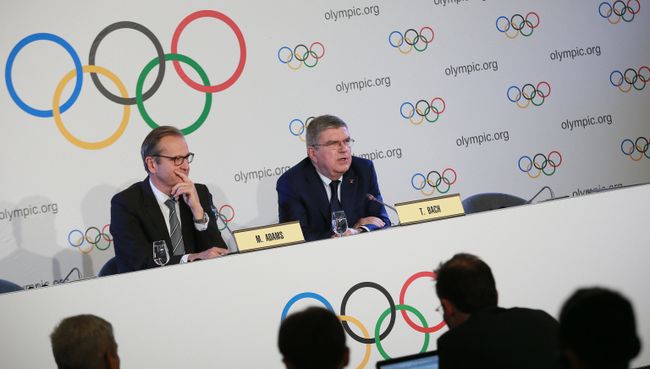Президент Международного олимпийского комитета Томас Бах на пресс-конференции по итогам заседания исполкома МОК в Лозанне. 6 декабря 2017 Президент Международного олимпийского комитета Томас Бах на пресс-конференции по итогам заседания исполкома МОК в Лозанне. 6 декабря 2017