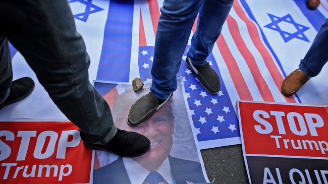 Протест в городе Газа против решения президента США Дональда Трампа признать Иерусалим столицей Израиля Протест в городе Газа против решения президента США Дональда Трампа признать Иерусалим столицей Израиля