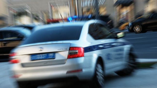 Автомобиль полиции на улице Москвы Автомобиль полиции на улице Москвы