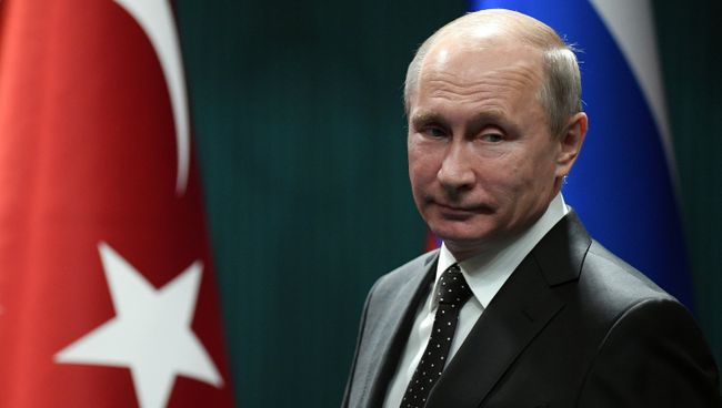 Президент РФ Владимир Путин во время совместного с президентом Турции Реджепом Тайипом Эрдоганом заявления для прессы. 11 декабря 2017 Президент РФ Владимир Путин во время совместного с президентом Турции Реджепом Тайипом Эрдоганом заявления для прессы. 11 декабря 2017