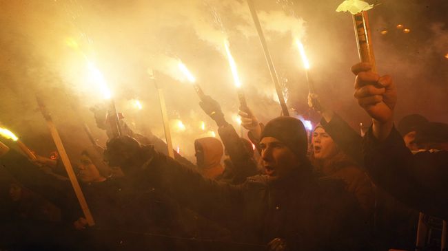 Активисты различных националистических партий во время митинга в Киеве, Украина. 1 января 2018 Активисты различных националистических партий во время митинга в Киеве, Украина. 1 января 2018