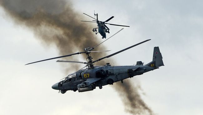 Вертолеты огневой поддержки Ка-52 Аллигатор. Архивное фото Вертолеты огневой поддержки Ка-52 Аллигатор. Архивное фото