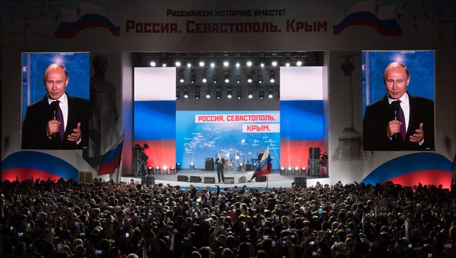 Президент РФ Владимир Путин выступает на концерте-митинге Россия. Севастополь. Крым в Севастополе. Архивное фото Президент РФ Владимир Путин выступает на концерте-митинге Россия. Севастополь. Крым в Севастополе. Архивное фото