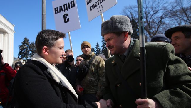 Надежда Савченко у здания Верховной Рады в Киеве. 22 марта 2018 Надежда Савченко у здания Верховной Рады в Киеве. 22 марта 2018