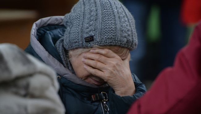 Родственница одного из пропавших без вести при пожаре в торговом центре Зимняя вишня в Кемерово. 26 марта 2018 Родственница одного из пропавших без вести при пожаре в торговом центре Зимняя вишня в Кемерово. 26 марта 2018