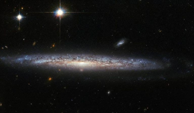 Галактики NGC 5714 и NGC 1787, снятые телескопом Хаббл Галактики NGC 5714 и NGC 1787, снятые телескопом Хаббл