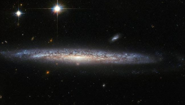 Галактики NGC 5714 и NGC 1787, снятые телескопом Хаббл. Архивное фото Галактики NGC 5714 и NGC 1787, снятые телескопом Хаббл. Архивное фото
