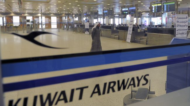 Стойка регистрации авиакомпании Kuwait Airways. Архивное фото Стойка регистрации авиакомпании Kuwait Airways. Архивное фото
