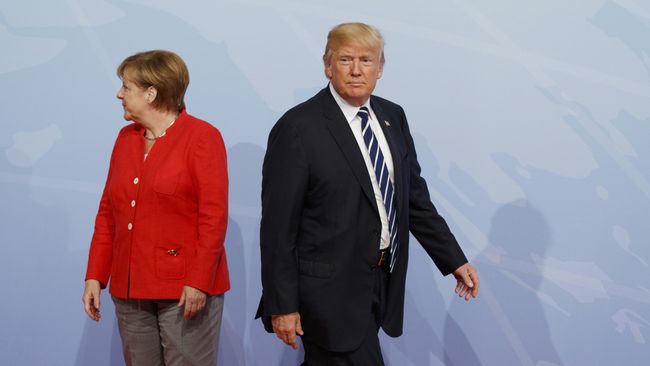 Ангела Меркель и Дональд Трамп на саммите G20 в Гамбурге. Архивное фото Ангела Меркель и Дональд Трамп на саммите G20 в Гамбурге. Архивное фото