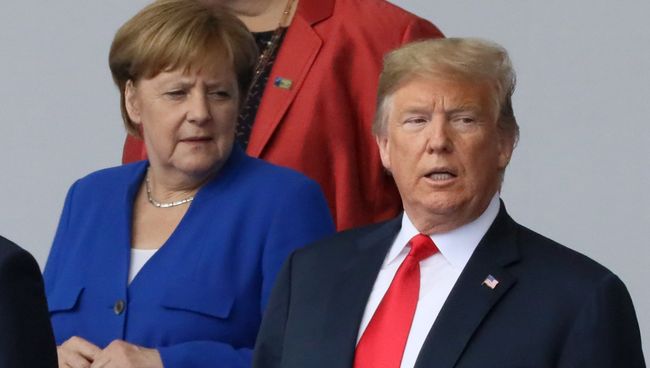 Ангела Меркель и Дональд Трамп на саммите НАТО в Брюсселе. 11 июля 2018 Ангела Меркель и Дональд Трамп на саммите НАТО в Брюсселе. 11 июля 2018