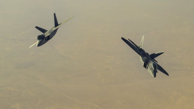 Американские истребители над территорией Сирии. Архивное фото Американские истребители над территорией Сирии. Архивное фото
