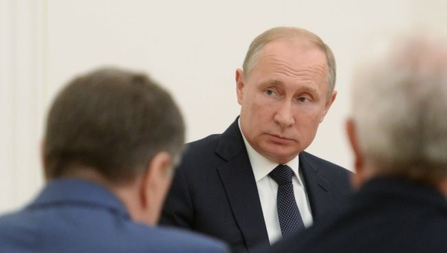 Президент РФ Владимир Путин во время встречи с президентом Молдавии Игорем Додоном. 14 июля 2018 Президент РФ Владимир Путин во время встречи с президентом Молдавии Игорем Додоном. 14 июля 2018