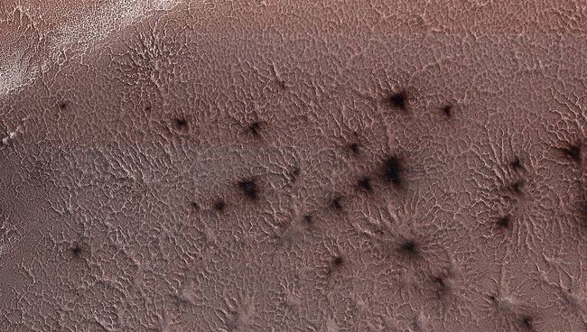 Снимок орбитального аппарата NASA с орбиты Марса с изображением Южного полюса Марса Снимок орбитального аппарата NASA с орбиты Марса с изображением Южного полюса Марса