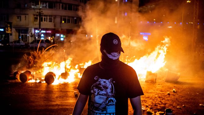 Участник акции протеста против действующего правительства в Бухаресте, Румыния. 10 августа 2018 Участник акции протеста против действующего правительства в Бухаресте, Румыния. 10 августа 2018