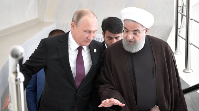 Владимир Путин и президент Ирана Хасан Роухани во время встречи в рамках саммита глав государств-участников V Каспийского саммита в Актау. 12 августа 2018 Владимир Путин и президент Ирана Хасан Роухани во время встречи в рамках саммита глав государств-участников V Каспийского саммита в Актау. 12 августа 2018