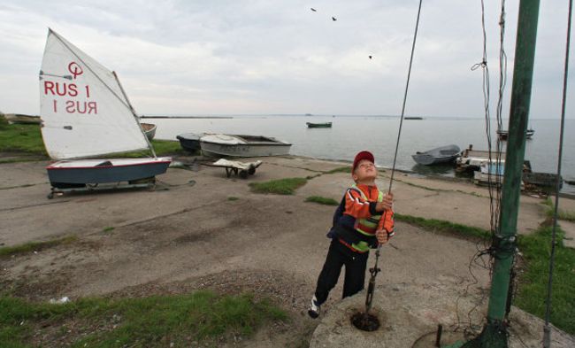 Побережье полуострова Балтийская коса в Калининградской области. Архивное фото Побережье полуострова Балтийская коса в Калининградской области. Архивное фото