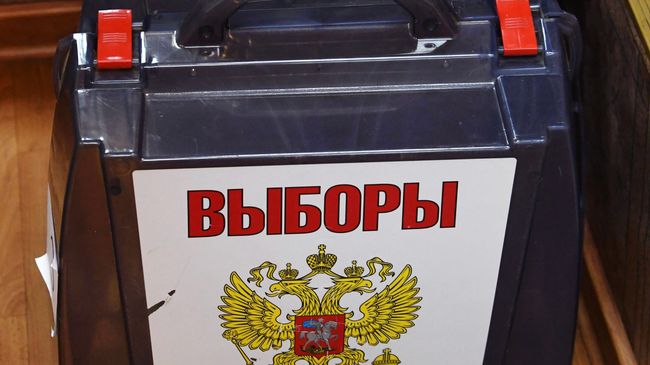 Урна для голосования на повторных выборах губернатора Приморского края на одном из избирательных участков во Владивостоке. 16 декабря 2018 Урна для голосования на повторных выборах губернатора Приморского края на одном из избирательных участков во Владивостоке. 16 декабря 2018