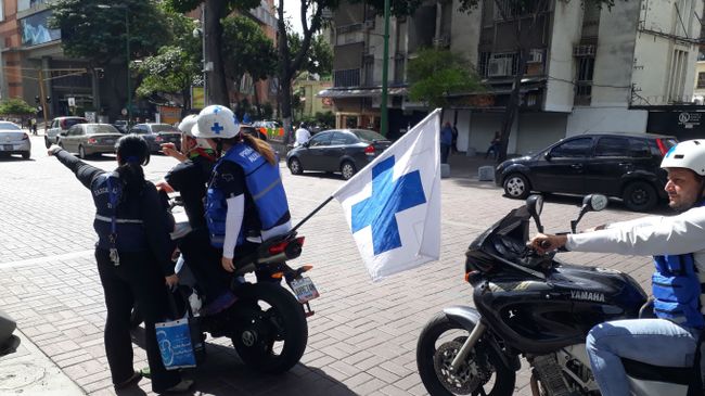 Добровольные медики на митинге оппозиции в Каракасе Добровольные медики на митинге оппозиции в Каракасе