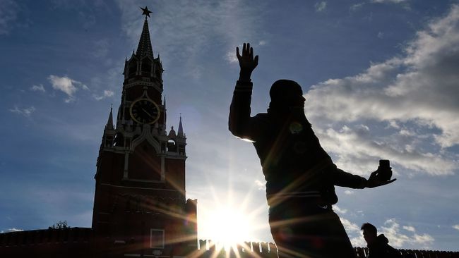 Туристы на Красной площади в Москве Туристы на Красной площади в Москве