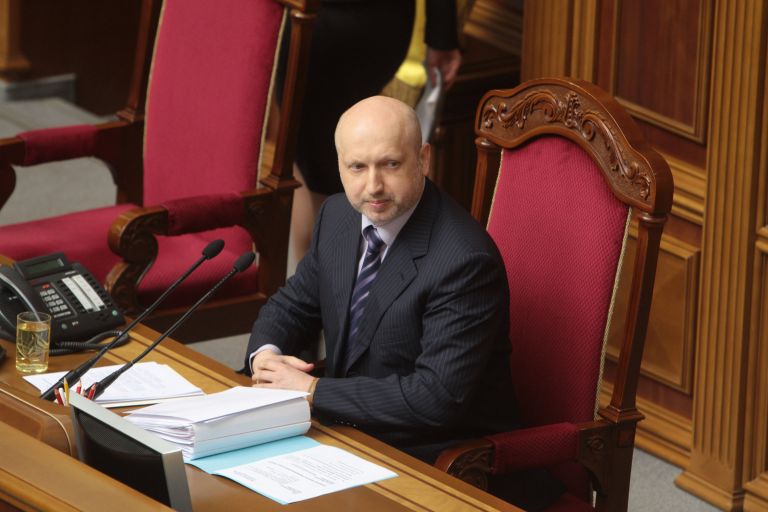 Исполняющий обязанности президента Украины Александр Турчинов на заседании Верховной рады в Киеве Исполняющий обязанности президента Украины Александр Турчинов на заседании Верховной рады в Киеве