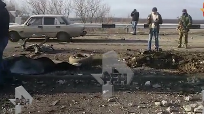 Видео с места взрыва машины на КПП в Донбассе Видео с места взрыва машины на КПП в Донбассе