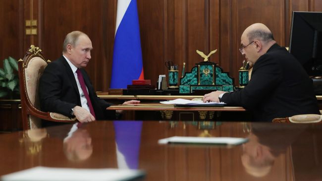 Президент РФ Владимир Путин и руководитель Федеральной налоговой службы Михаил Мишустин во время встречи Президент РФ Владимир Путин и руководитель Федеральной налоговой службы Михаил Мишустин во время встречи