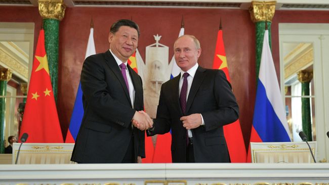Президент РФ Владимир Путин и председатель КНР Си Цзиньпин Президент РФ Владимир Путин и председатель КНР Си Цзиньпин