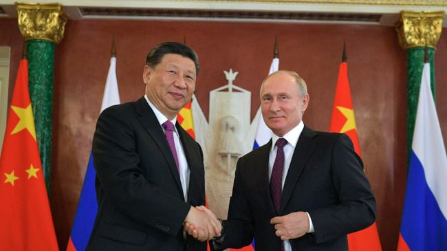 Президент РФ Владимир Путин и председатель Китайской Народной Республики Си Цзиньпин во время встречи Президент РФ Владимир Путин и председатель Китайской Народной Республики Си Цзиньпин во время встречи