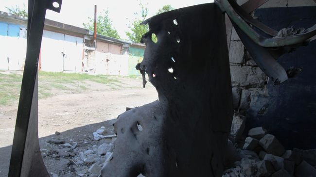 Гараж в Горловке, разрушенный вследствие обстрела. 8 июля 2019 Гараж в Горловке, разрушенный вследствие обстрела. 8 июля 2019