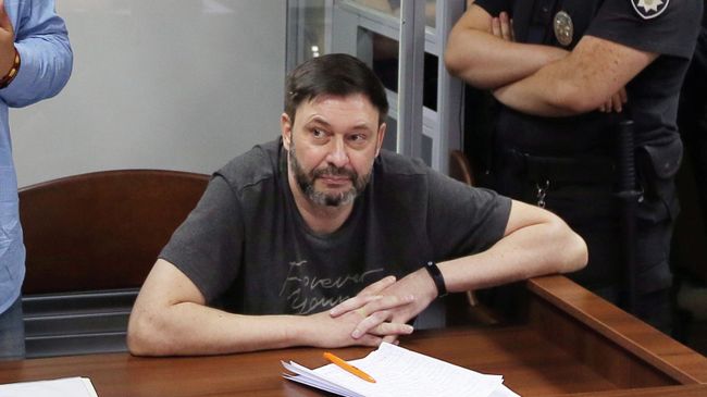 Руководитель портала РИА Новости Украина Кирилл Вышинский и его адвокат Андрей Доманский на заседании суда Руководитель портала РИА Новости Украина Кирилл Вышинский и его адвокат Андрей Доманский на заседании суда