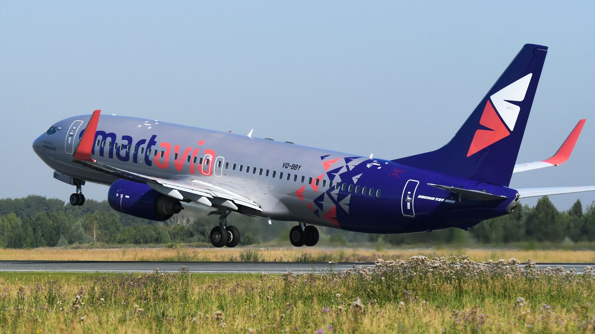 Самолет Boeing 737-800 авиакомпании Smartavia во время взлета в аэропорту Толмачево Самолет Boeing 737-800 авиакомпании Smartavia во время взлета в аэропорту Толмачево - РИА Новости, 1920, 23.03.2022