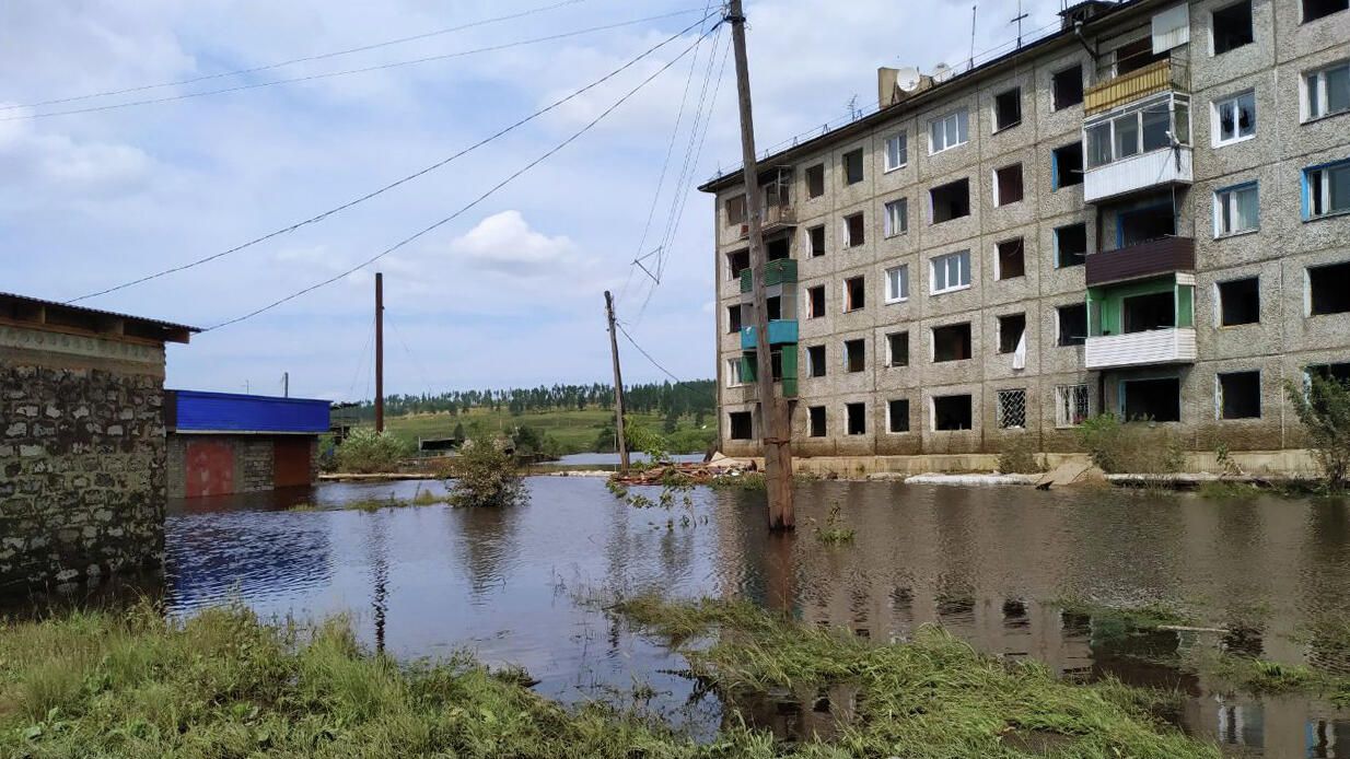 Затопленная улица в городе Тулун в Иркутской области Затопленная улица в городе Тулун в Иркутской области - РИА Новости, 1920, 22.05.2025