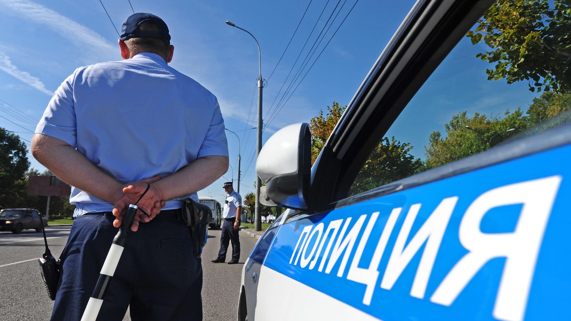 Инспектор дорожно-патрульной службы на маршруте патрулирования Инспектор дорожно-патрульной службы на маршруте патрулирования - РИА Новости, 1920, 06.06.2021