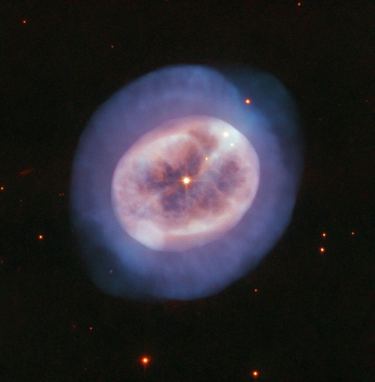 Фотография планетарной туманности NGC 2022 в созвездии Ориона Фотография планетарной туманности NGC 2022 в созвездии Ориона