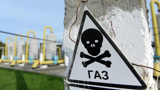 Предупреждающая табличка рядом с подземным хранилищем газа во Львовской области Украины Предупреждающая табличка рядом с подземным хранилищем газа во Львовской области Украины