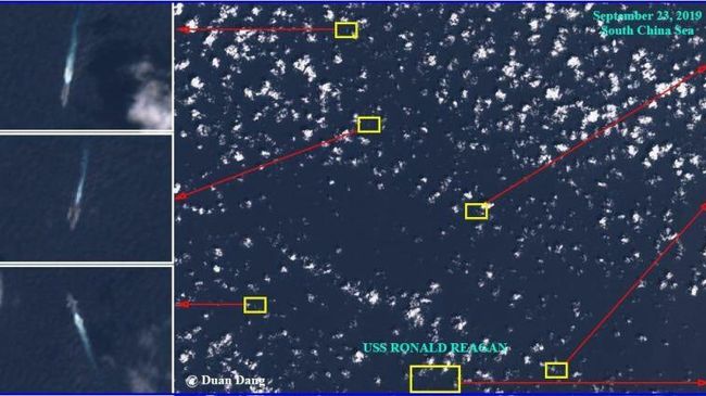 USS Ronald Reagan и несколько неопознанных военных кораблей в Южно-Китайском море USS Ronald Reagan и несколько неопознанных военных кораблей в Южно-Китайском море