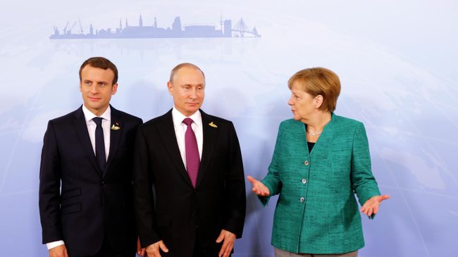 Президент Франции Эмманюэль Макрон, президент РФ Владимир Путин и канцлер Германии Ангела Меркель Президент Франции Эмманюэль Макрон, президент РФ Владимир Путин и канцлер Германии Ангела Меркель