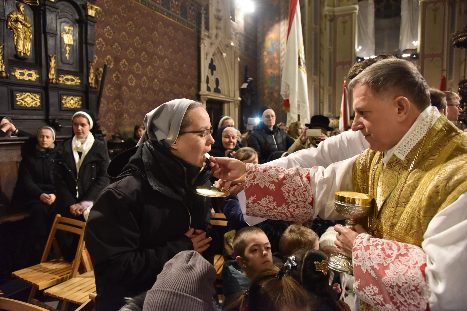 Рождественская месса в Латинском кафедральном соборе (Митрополичья базилика Успения Пресвятой Девы Марии) во время празднования католического Рождества во Львове Рождественская месса в Латинском кафедральном соборе (Митрополичья базилика Успения Пресвятой Девы Марии) во время празднования католического Рождества во Львове - РИА Новости, 1920, 30.04.2021