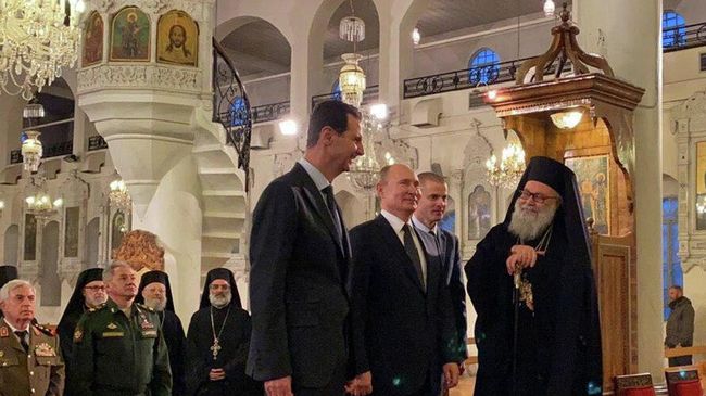 Президент России Владимир Путин и президент Сирийской Арабской Республики Башар Асад в Соборе Святой Девы Марии в Дамаске, Сирия. 7 января 2020 Президент России Владимир Путин и президент Сирийской Арабской Республики Башар Асад в Соборе Святой Девы Марии в Дамаске, Сирия. 7 января 2020