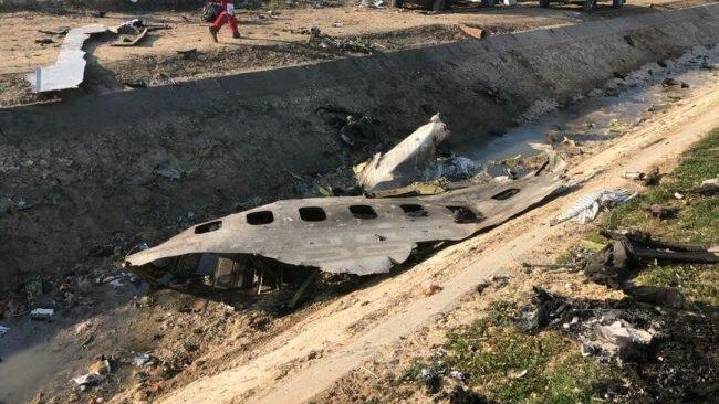 На месте крушения пассажирского лайнера Международных авиалиний Украины Boeing 737-800 неподалеку от тегеранского международного аэропорта имени Имама Хомейни На месте крушения пассажирского лайнера Международных авиалиний Украины Boeing 737-800 неподалеку от тегеранского международного аэропорта имени Имама Хомейни - РИА Новости, 1920, 21.05.2021