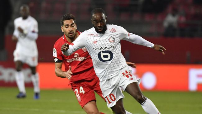 Lille's French forward Jonathan Ikone (R) vies with Dijon's French defender Wesley Lautoa (L) during the French L1 football match between Dijon Football Cote-D'Or and Lille LOSC at the Gaston Gerard stadium in Dijon, central France on January 12, 2020. (Photo by PHILIPPE DESMAZES / AFP) Lille's French forward Jonathan Ikone (R) vies with Dijon's French defender Wesley Lautoa (L) during the French L1 football match between Dijon Football Cote-D'Or and Lille LOSC at the Gaston Gerard stadium in Dijon, central France on January 12, 2020. (Photo by PHILIPPE DESMAZES / AFP)