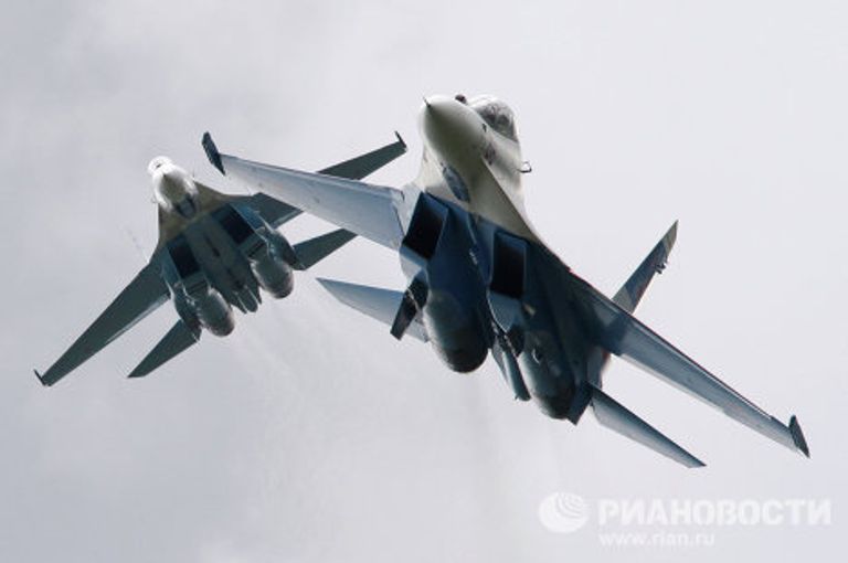 Истребители Су-27 пилотажной группы Соколы России Истребители Су-27 пилотажной группы Соколы России