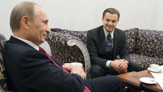 Владимир Путин и американский киноактер Леонардо Ди Каприо. Архивное фото Владимир Путин и американский киноактер Леонардо Ди Каприо. Архивное фото