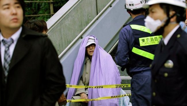 Пострадавшие в результате землетрясения в Токио Пострадавшие в результате землетрясения в Токио